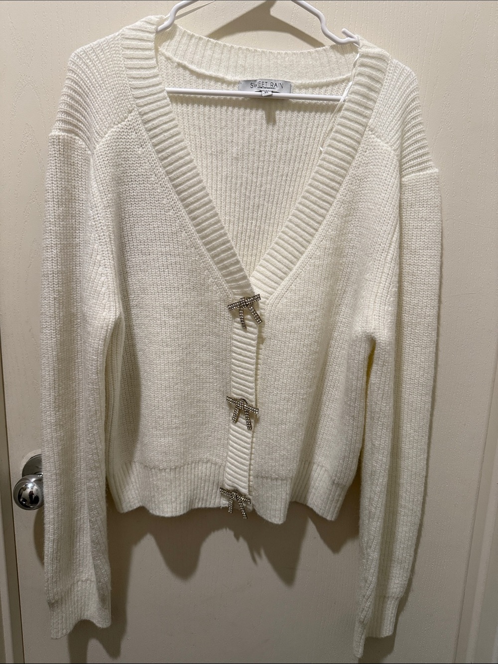 Sweet Rain Ivory V-Neck Knit Cardigan with Bow Clasps